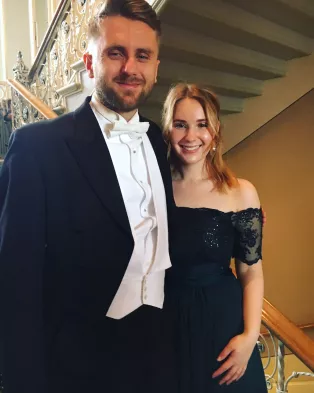 Emma and her fiancée at UPF student ball in 2019.